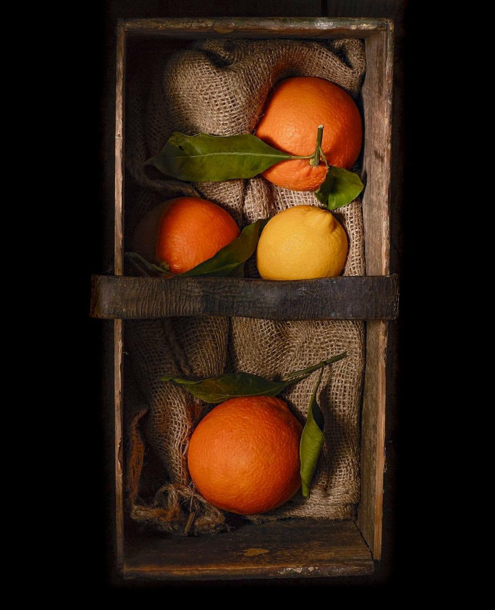 Citrus Fruits in an Old Wooden Box