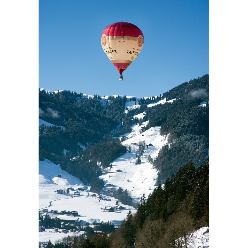 Taittinger Hot Air Balloon ascent in the Swiss Alps. Gstaadt, Switzerland